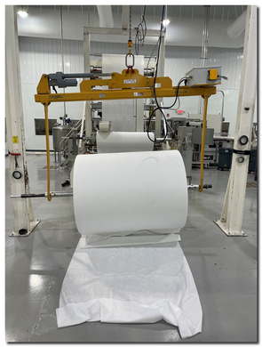 These substrate rolls must be lifted into place during an important phase of the production process.